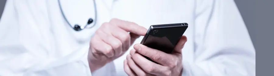 phone in doctor's hand